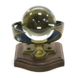 Sunshine Recorder brass housing on wooden base with approx. 3 3/4'' glass sphere