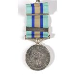 A Royal Observer Corps Medal, awarded to OBSERVER E.G. FISHER, with additional 12 year service bar