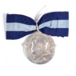 A Chinese National Medal of Honour, Naval Issue, in silver with navy blue and sky blue ribbon **