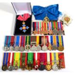 A Composite Group of Thirty Medals as Awarded to Sir Winston Churchill KG,OM,CH, on five card