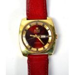 A gold plated automatic calendar centre seconds wristwatch, signed Nivada Grenchen, model: Taravana