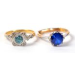 A blue zircon and diamond ring, finger size N; and a blue paste ring, 4.8g gross (2)