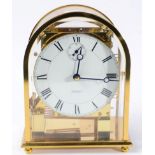 A gilt metal chiming mantel clock signed Kieninger