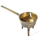 A 19th century bronze skillet, raised on three feet, by Bailey & Street