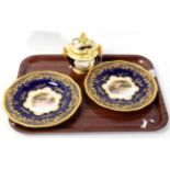 A pair of good quality Coalport cabinet plates, the central views named to reverse ''Win Bridge''