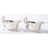 A matched pair of silver sauce boats, Viners Ltd, Sheffield 1937/45; and a late Victorian silver and