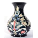 A Moorcroft Snakeshead pattern vase, boxed