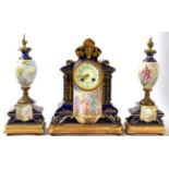 A French porcelain clock garniture, gilt mounts