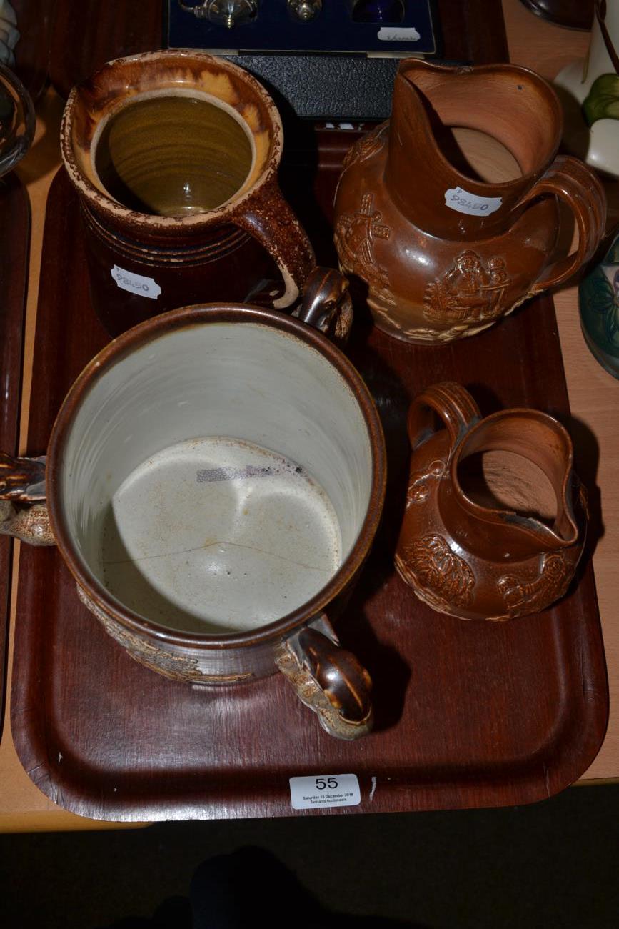 A 19th century salt glazed stoneware tyg; and three similar jugs (4) - Image 3 of 13