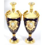 A pair of Coalport twin handled vases, the central views named to base, one ''Weir Bridge'' the