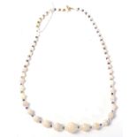 An opal, iolite and rock crystal bead necklace, graduated opal beads spaced by round iolite and