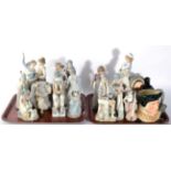 Fifteen Lladro and similar figures; two Royal Doulton Toby jugs; and another (two trays)