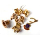 A collection of ten various 9 carat gold charms, including a rabbit, easter egg and dog, 22.2g gross