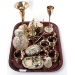 A group of silver items to include napkin rings; sugar tongs; a Victorian drum shaped mustard pot