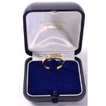 An 18 carat gold diamond ring, finger size Q, 3.5g