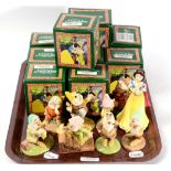 Royal Doulton Snow White and the Seven Dwarfs including an additional Dopey, each boxed (9)