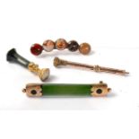 A hardstone desk seal, a propelling pencil, a nephrite brooch and a Scottish hardstone brooch