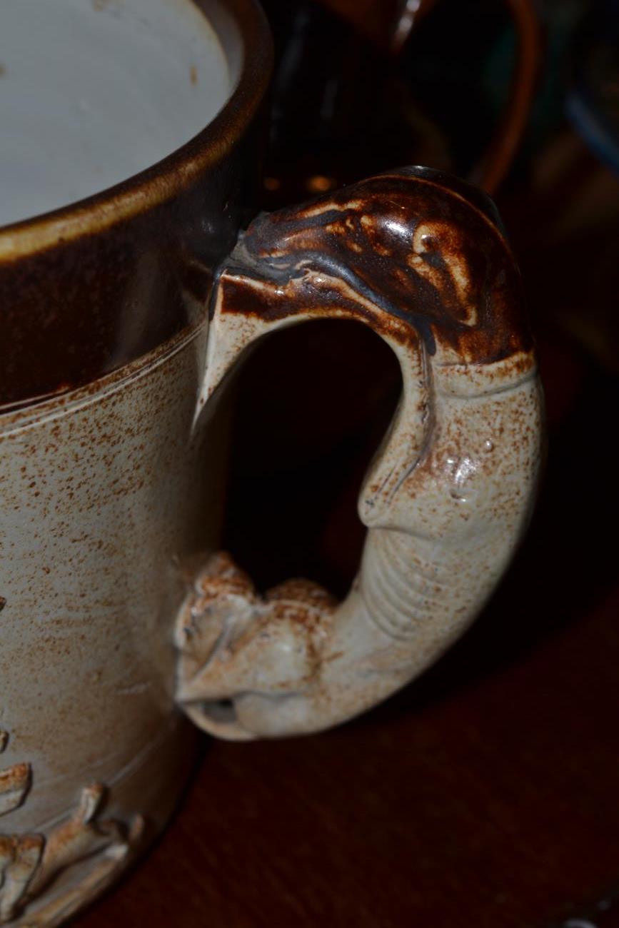 A 19th century salt glazed stoneware tyg; and three similar jugs (4) - Image 11 of 13