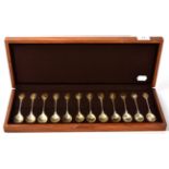 A set of twelve parcel gilt silver spoons for the RSPB by John Pinches, in fitted box with brochure