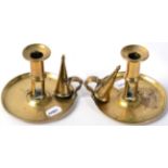 A pair of 19th century brass push up chambersticks and snuffers