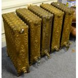 A set of five gilded cast iron Victorian radiators