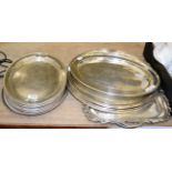 A large group of assorted electroplated serving trays and dishes