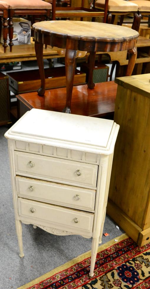 A marble topped white painted three height chest of drawers together with an occasional table with