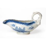 A Longton Hall Porcelain Cos Lettuce Sauce Boat, circa 1755, painted in underglaze blue with