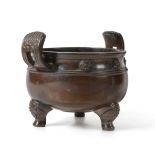 A Chinese Bronze Censer, Ding, bears six character Xuande reign mark, of ovoid form with reeded loop