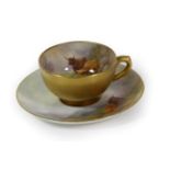 A Royal Worcester Porcelain Miniature Cabinet Cup and Saucer, by Harry Stinton, circa 1919,