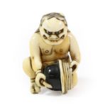 A Japanese Ivory Netsuke, Edo period, as a kneeling Oni holding a half pot, 4cm high Provenance: