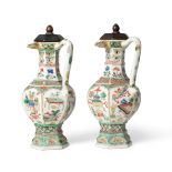 A Pair of Chinese Porcelain Puzzle Jugs, Kangxi, of hexagonal baluster form with pierced necks and