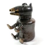 A Brown Glazed Stoneware Bear Jug and Cover, early 19th century, the seated animal with its paws