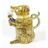 A Pratt Type Bear Jug and Cover, early 19th century, the seated animal with brown markings and ochre