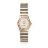 A Lady's Steel and Gold Diamond Set Wristwatch, signed Omega, model: Constellation, circa 2010,