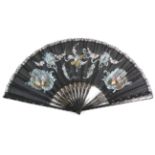 A Large Circa 1890's Black Gauze Fan, mounted à l'Anglaise on black wooden sticks, the upper
