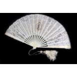A Late 19th Century Point De Gaze Needle Lace Fan Mounted on Ivory, the sticks gilded, the guards