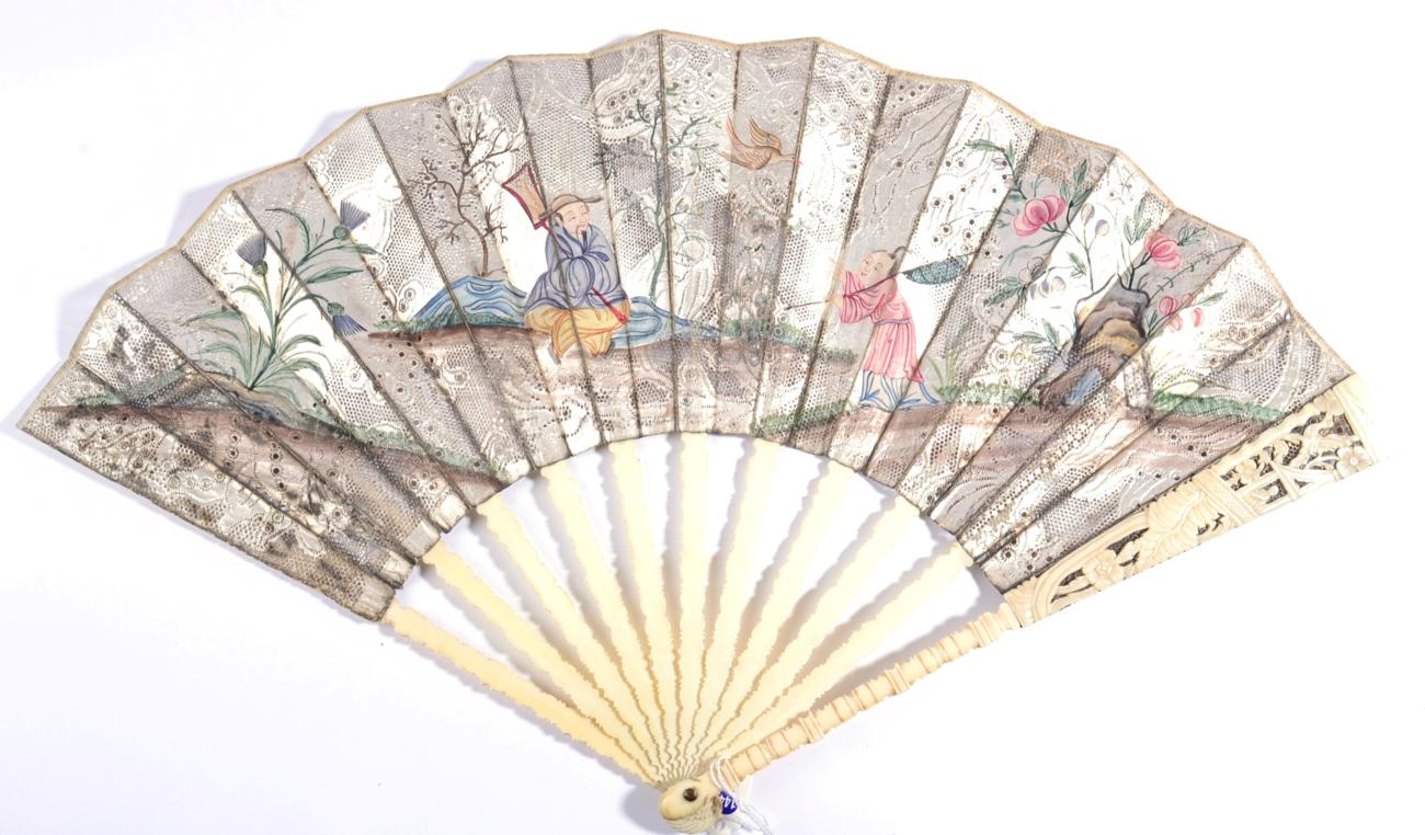A Mid-18th Century Fan in the Chinoiserie Style, découpé, the single paper leaf in silver and