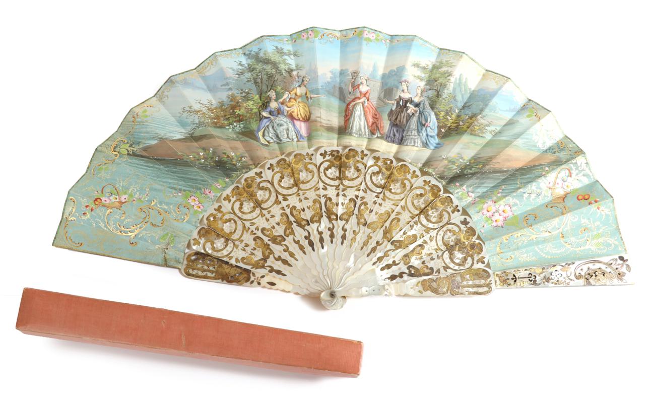 A Mid-19th Century Mother-of-Pearl Fan, the monture carved, pierced and gilded, the gorge sticks