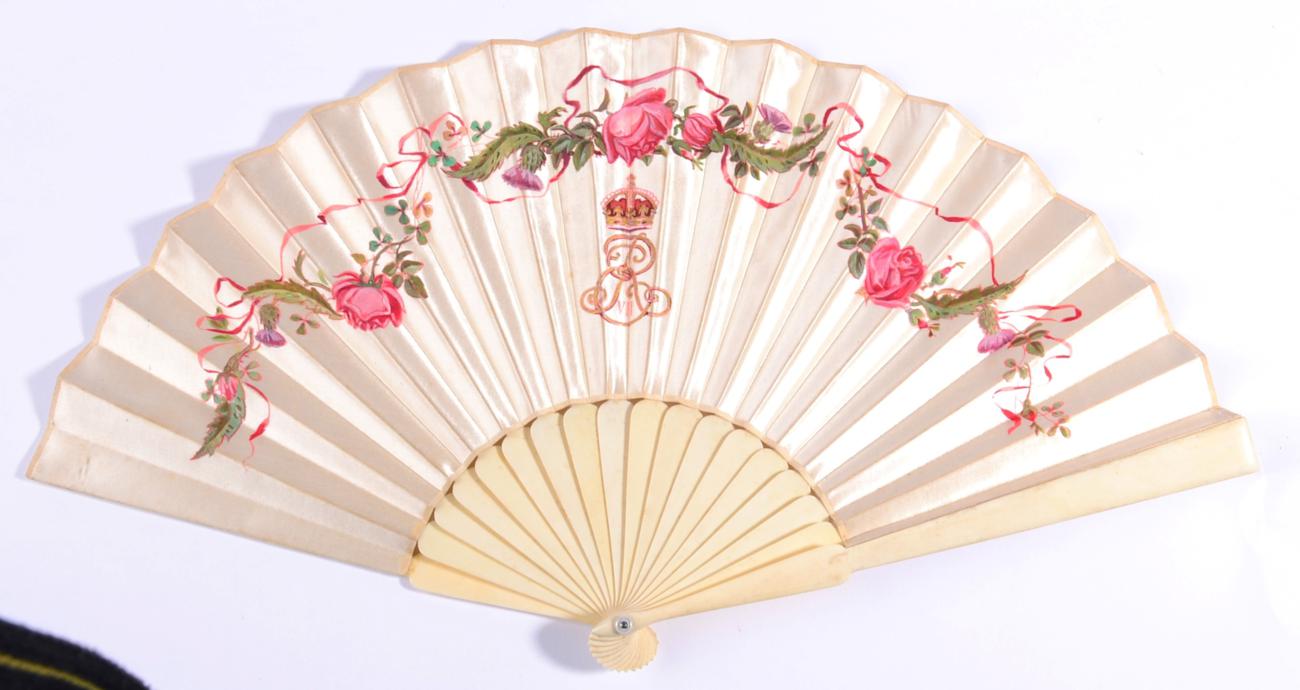 Circa 1902, A Commemorative Fan, of cream satin mounted on plain ivory sticks, painted with the