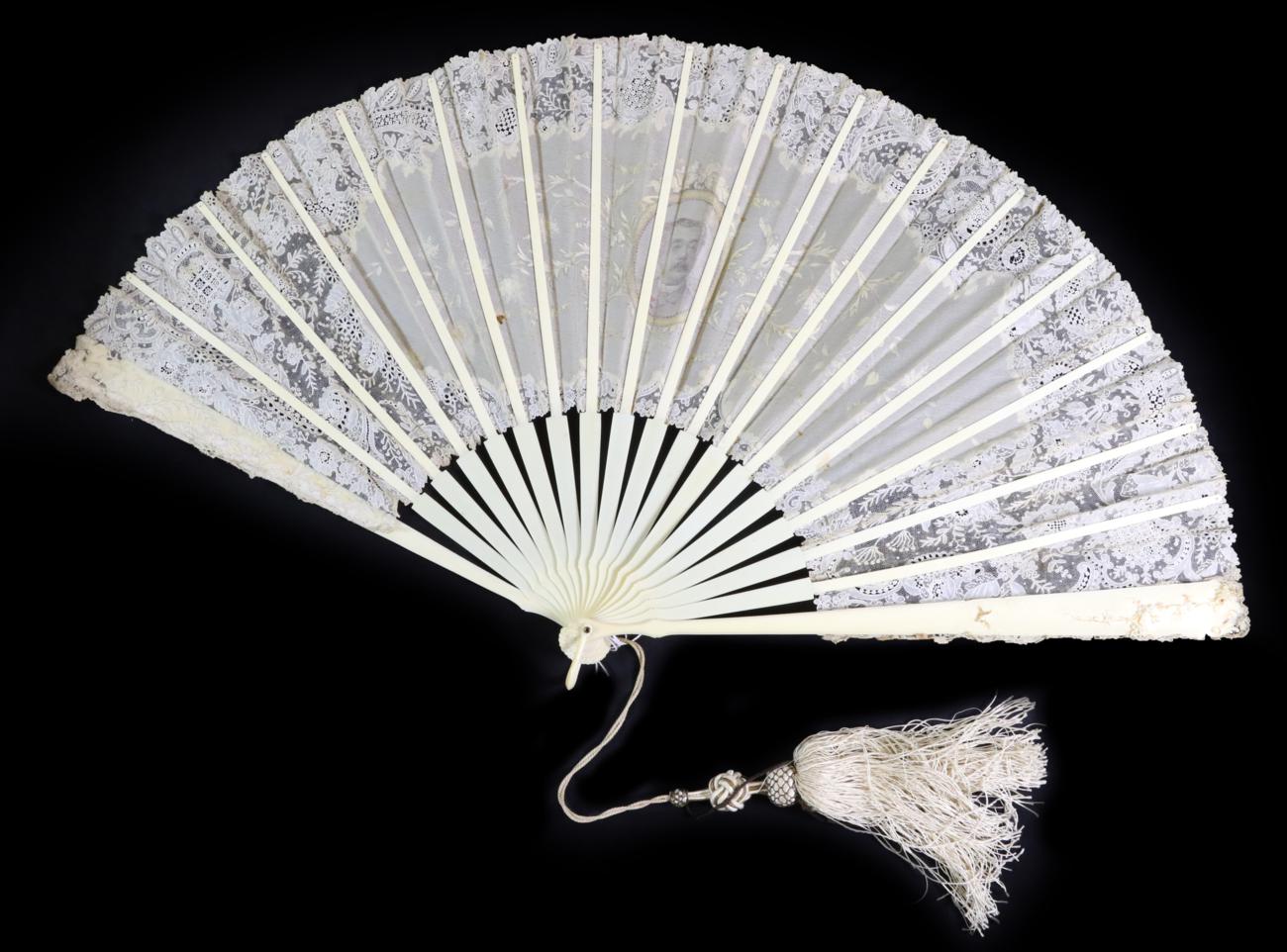 A Late 19th Century Point De Gaze Needle Lace Fan Mounted on Ivory, the sticks gilded, the guards - Image 2 of 3