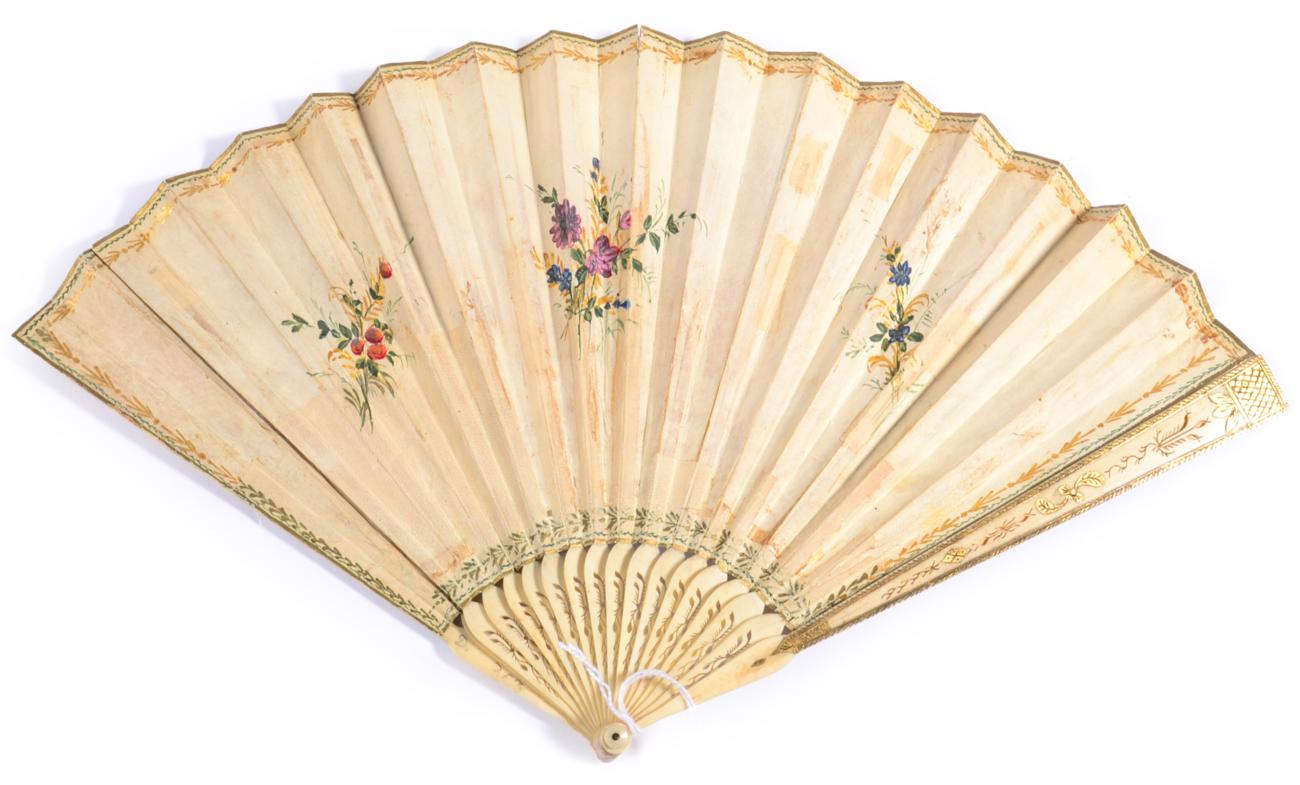A Wedding Fan, Regency Period, the monture of pierced and gilded ivory sticks, the double leaf - Image 2 of 2