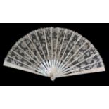 A Circa 1880's Pink Mother-of-Pearl Fan, mounted with a Carrickmacross needle lace leaf, the net