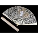 A Large Late 19th Century Bone Fan, the monture lightly carved with delicate and mainly floral