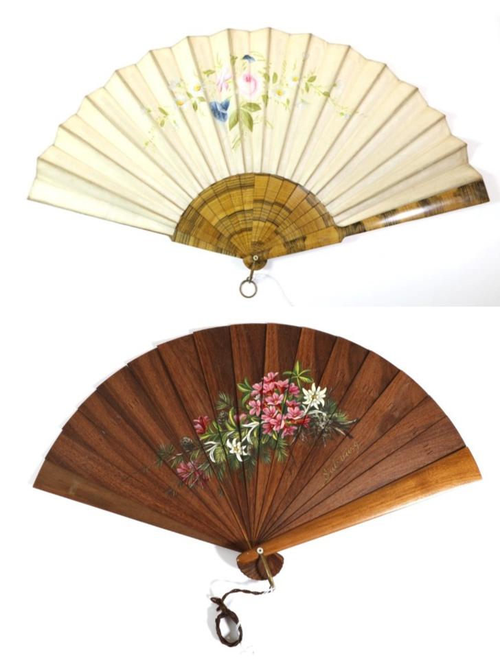 A Large Late 19th Century Wooden Fan, with interesting markings to the polished wood. The leaf of