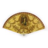 Circa 1860's, A Small Painted Ivory Brisé Fan, bearing a portrait of Marie Antoinette, Queen of