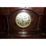 Oak mantle clock with a silver presentation plaque dated 1925 to a Reverend in Shap, Cumbria