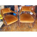 Pair of Victorian mahogany upholstered open armchairs