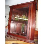 Glazed mahogany corner cabinet