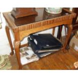 Carved hardwood table with tray under